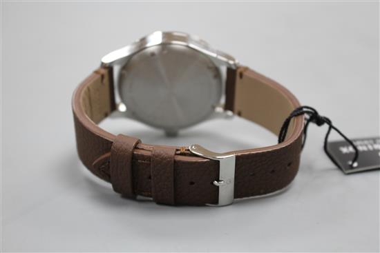 A gentlemans modern stainless steel Victorinox Swiss Army quartz wrist watch, with baton numerals and date aperture